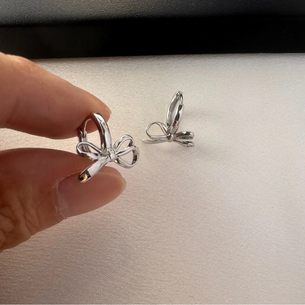Huggie Bow Silver Hoop Earrings for Women - Picture 4 of 5
